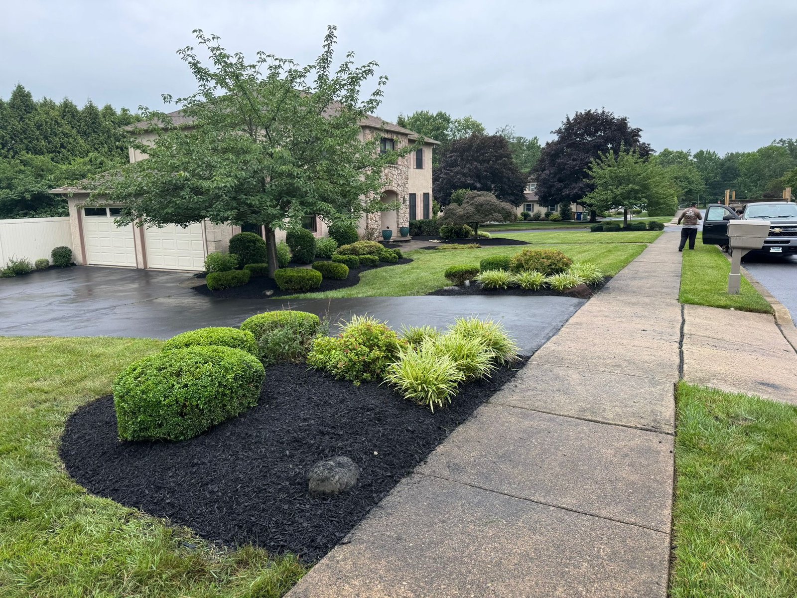 Mulch installation work by Green Force Property Services